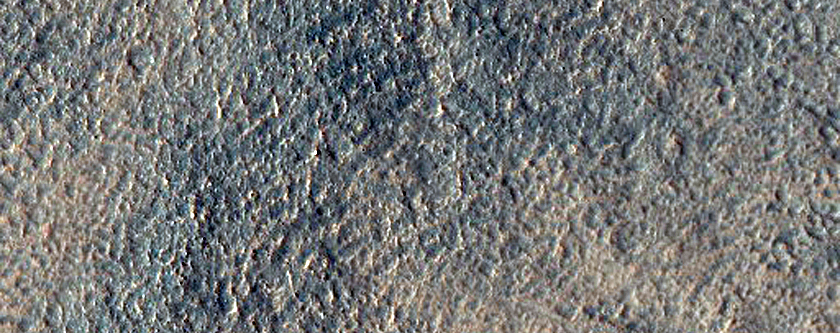 Layered Structure in Small Crater in Nilosyrtis Mensae