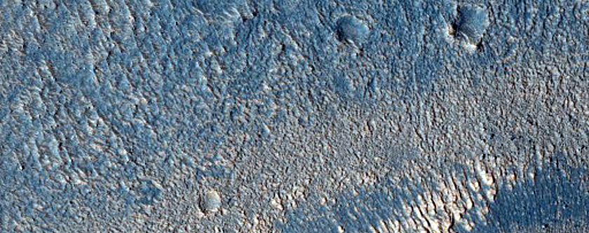 Mantled Mounds in Erebus Montes