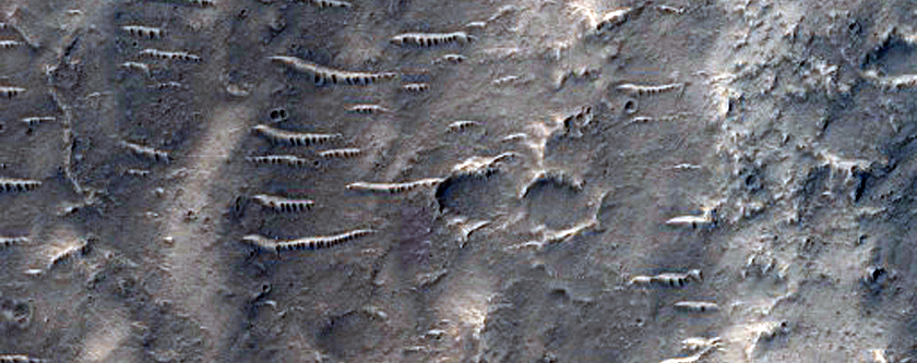 Landform Transition from Chaos Terrain to Outflow Channel