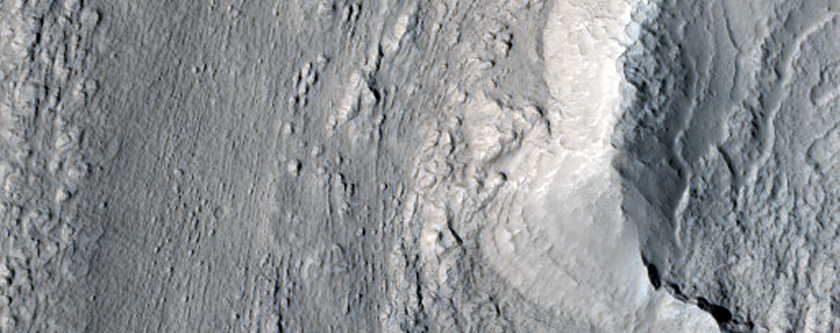 Arc-Shaped Flow Feature at End of Valley in Protonilus Mensae