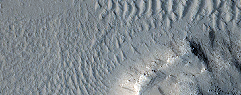 Valleys Cutting across Northern Lycus Sulci