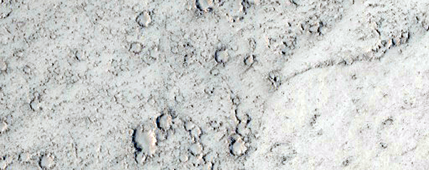 Lines of Cones around Crater in Tartarus Colles Region