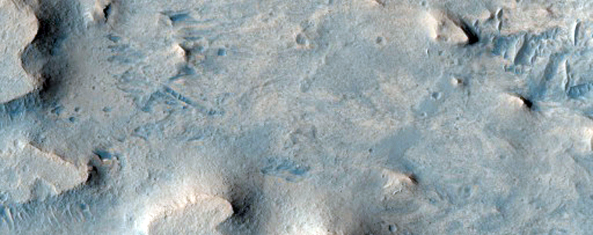 Transition from Flow to Light-Toned Material West of Meridiani Planum