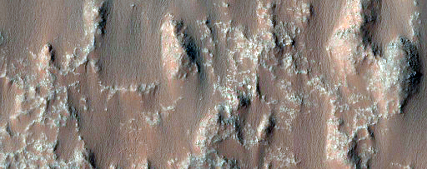 Dunes and Light-Toned Bedrock in Crater East of Briault Crater