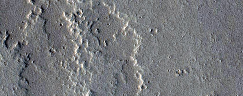 Lumps on Tharsis Region Lava