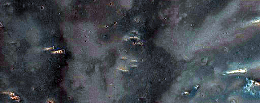 Knob and Crater Wall South of Syrtis Major Region