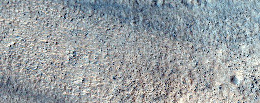 Layered Features in Hellas Planitia