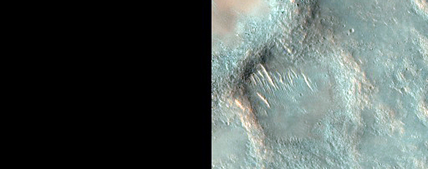 Dark Streaks on Crater Wall