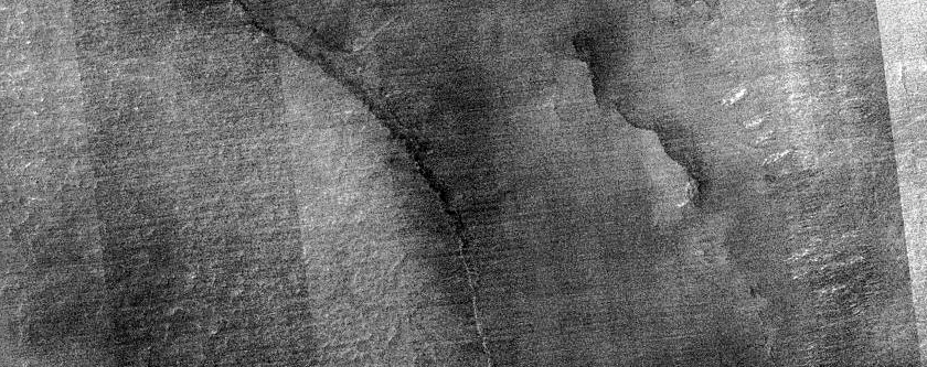 Bedrock Exposed in Crater-Floor Pit