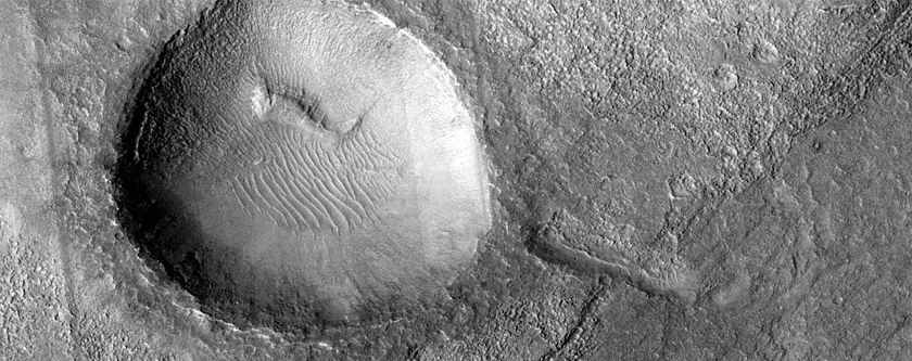 Complex of Anastomosing Valleys on Northeast Hellas Planitia Rim