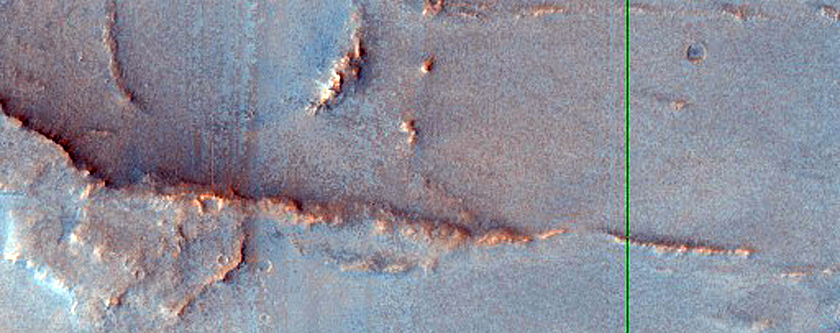Flow Ejecta from Impact Crater with Diverse Hydrated Minerals