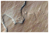 Flow Boundary in Tharsis Region East of Pavonis Mons
