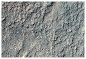 Layers on Floor of Southern Mid-Latitude Crater