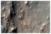 Layered Deposits North of Hellas Planitia