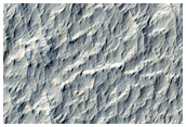 Crater with Yardangs and Interior Mound in Arabia Terra