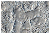 Pits and Hummocks in Ismeniae Fossae Region