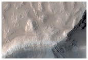Crater Cut by Graben in Tantalus Fossae