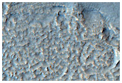 Layered Features on Mesa in Deuteronilus Mensae