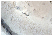 Trough with Channels in Elysium Fossae