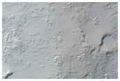 Longitudinally Aligned Mounds in Hanging Channel within Mangala Valles