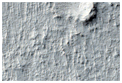 Memnonia Sulci and Neighboring Landforms