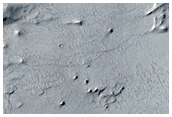 Knobby and Layered Material in Capen Crater
