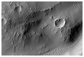 An Irregular Crater Intersecting Graben in Tractus Albus