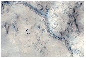 Inflation Features in Phlegra Dorsa