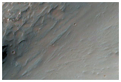Sandldur mefram hlendisspildu  austurhluta Coprates Chasma
