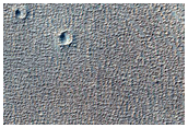 Syria Planum and Claritas Fossae Dust-Raising Event Monitoring Site