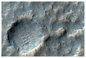 Landform Transition from Chaos Terrain to Outflow Channel