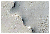 Small Crater with Cliff East of Henry Crater