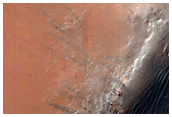 Layers on Floor of Small Crater in Noachis Terra