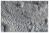 Features on Crater Floor South of Moreux Crater