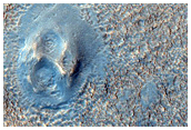 Small Mounds with Summit Pits and Plains-Forming Materials
