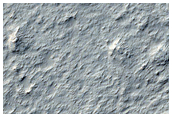 Fan and Channel Forms in Memnonia Sulci Region