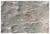 Putative Chloride-Rich Deposits inside Eroded Crater