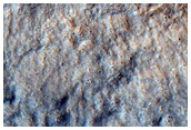 Northern Plains Crater with Striated Ejecta