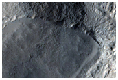 Possible Marginal Ridge at Base of Mesa Wall South of Moreux Crater
