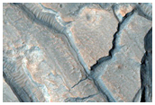 Fractured Floor Materials within Crater in Arabia Terra