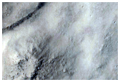 Outflow Channel Features in Arena Colles Region