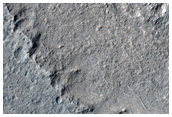 Crater and Associated Depression Near Flow Edge
