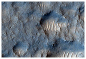 Topographic Low with Thermally-Distinct Terrain in THEMIS IR Images