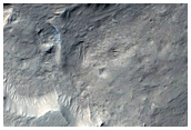 Eroded Materials Near Robert Sharp Crater