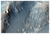 Topographic Low with Thermally-Distinct Terrain in THEMIS IR Images