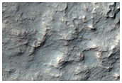 Putative Chloride-Rich Deposits on Crater Rim