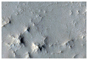 Trough and Ridges along Crater Slope