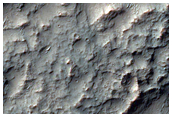 Basin and Channel Features in Terra Sirenum Intercrater Terrain