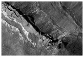 Fractured Floor Materials within Crater in Arabia Terra