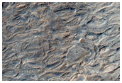Sinus Meridiani and Meridiani Planum Stratigraphy